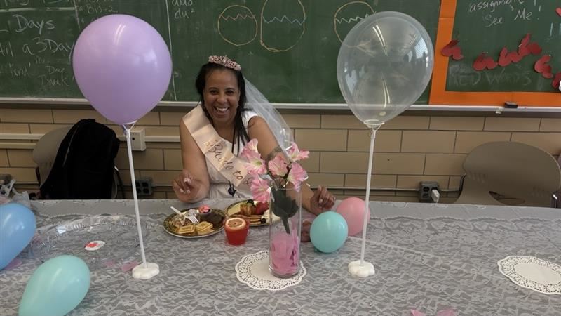  Woman at table dressed as a bride